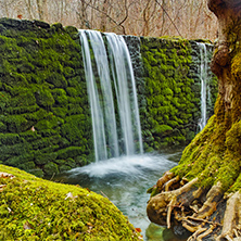 Beautiful waterfall in winter foreston Crazy Mary River, Belasitsa Mountain, Bulgaria